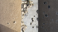 bullet holes in wall
